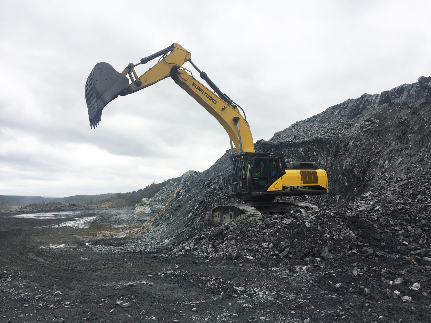 excavator digging coal
